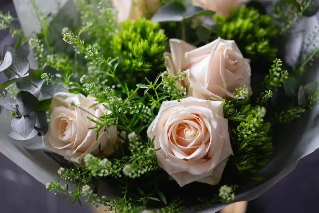 bouquet of white roses on international womens day free photo