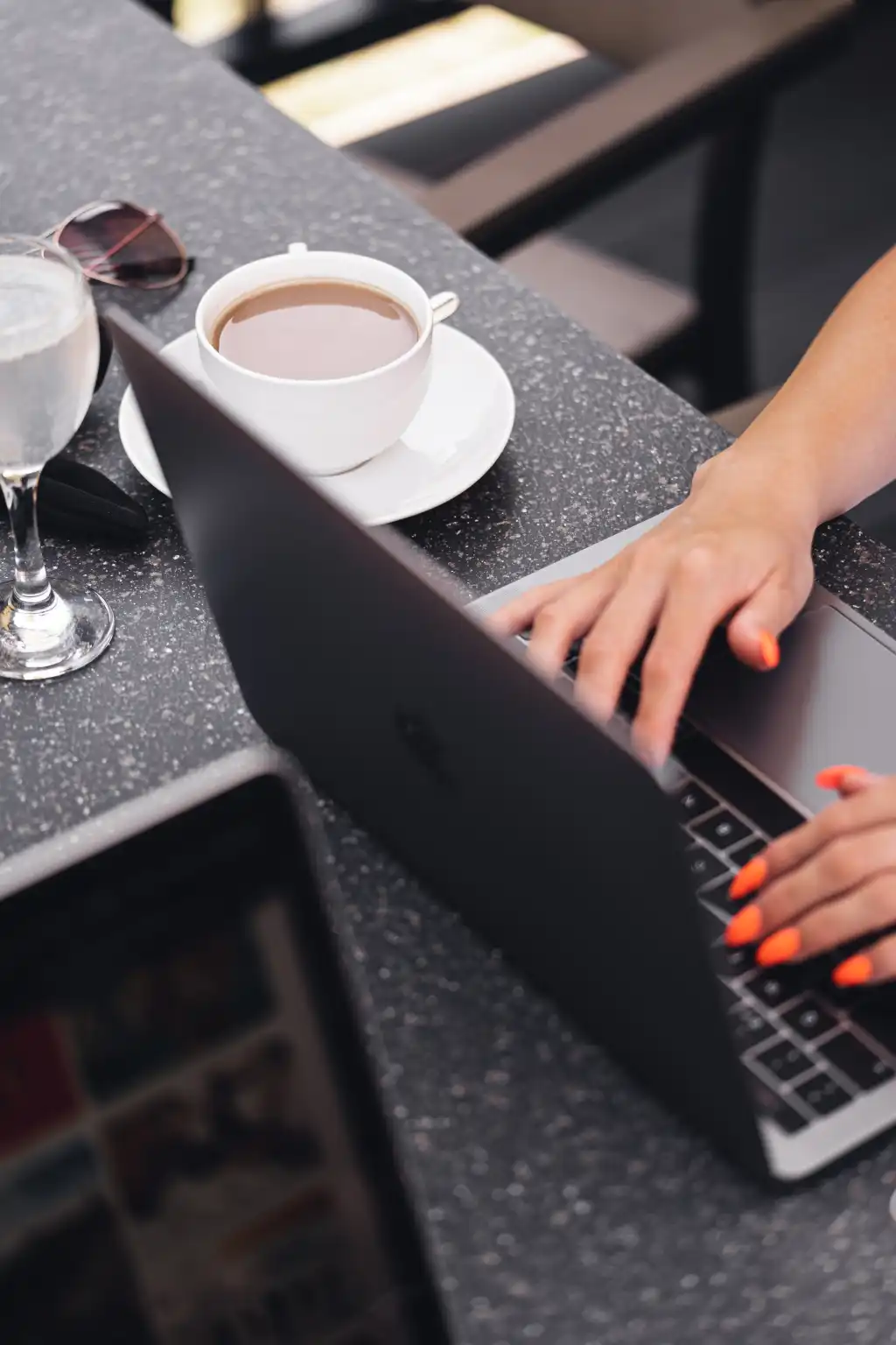 nomad woman working outside on laptop with morning coffee free photo