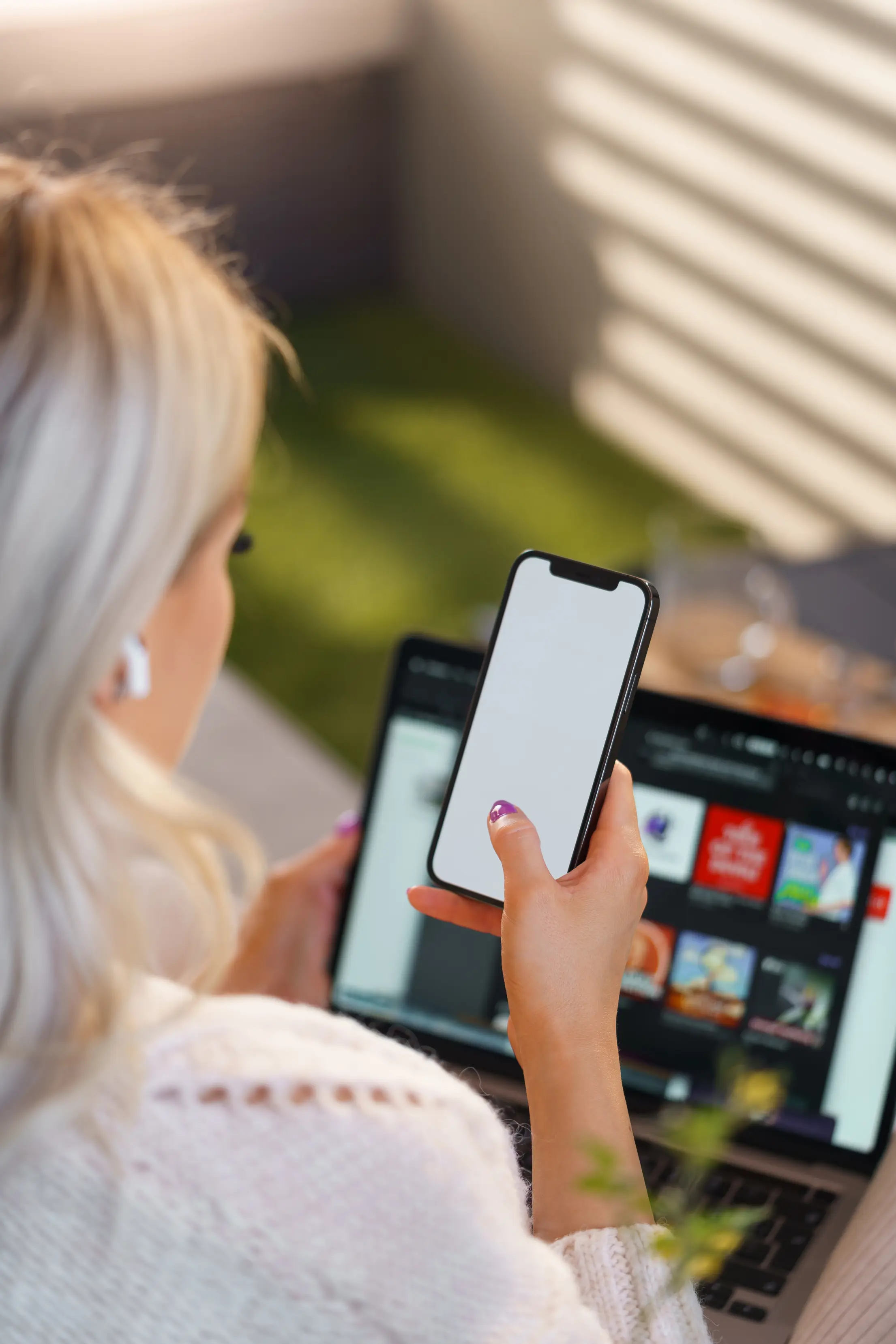 woman listening podcasts and using her smartphone free photo